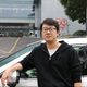 Uber driver Tommy Wu with his Mazda6 sedan.
